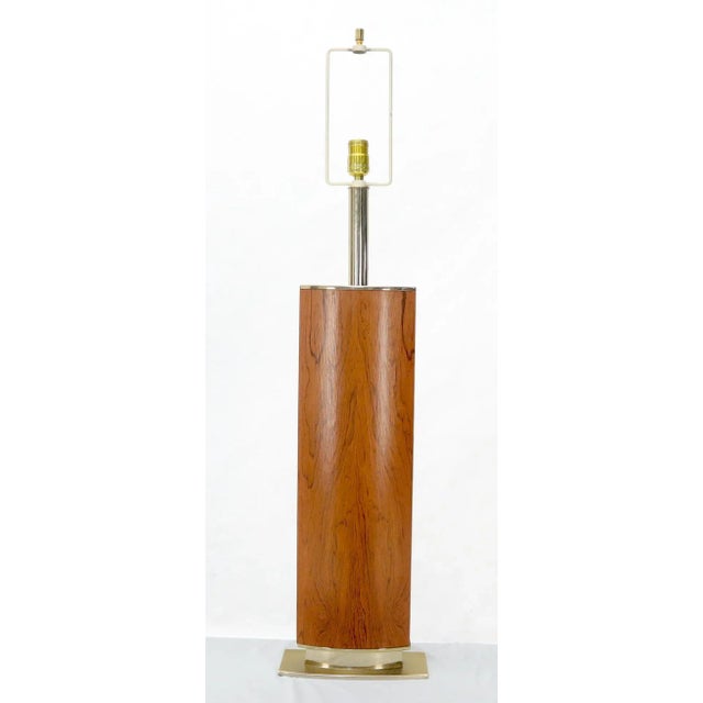 Mid-Century Modern brass and rosewood base large table lamp. Parzinger decor match. This item includes restricted...