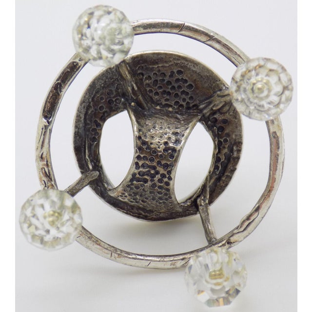 A sweet vintage dollhouse miniature depicting a baby walker, handmade in Italy between the 1970s and 1980s in genuine...