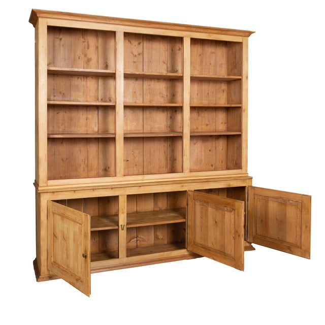 19th-century Danish pine shop counter, traditionally known as a Danish grocer’s desk. This 8' tall wall unit features open...