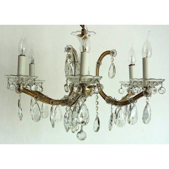 Maria Theresia Chandelier in Brass and Crystal from Palwa, 1960s, in Very Good conditions. Designed 1960 to 1969 I have...