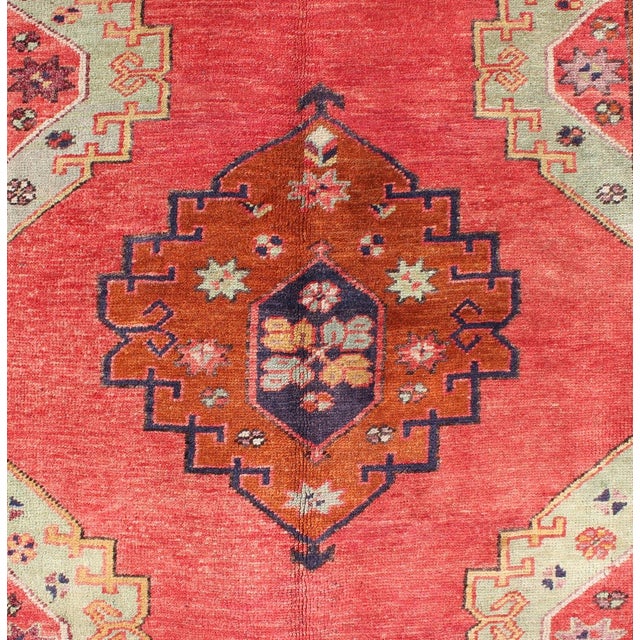 Textile Red Field Vintage Turkish Oushak Rug With Vertical Geometric Medallions For Sale - Image 7 of 8