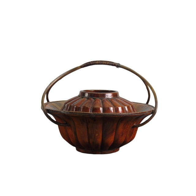 The pumpkin basket is a lovely handmade wooden basket originating from China. With its unique shape resembling a pumpkin,...