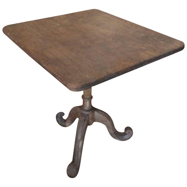 Beautiful, hand-carved antique teak wood table from Madura. The top is cut from a single slab with a hand-carved bevelled...
