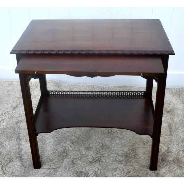 Vintage (1970's) Writing Table w/Pull-out has an Edwardian Style. Made by Wellington Hall Furniture. The Wood is Mahogany....