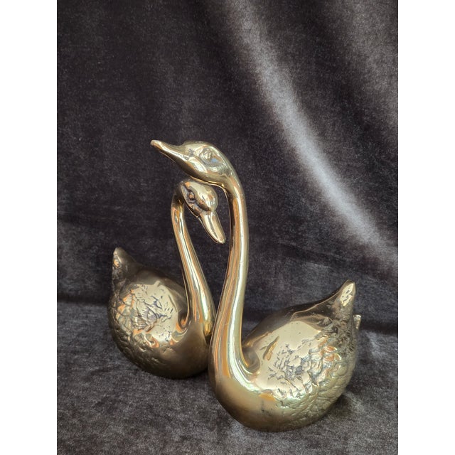 Mid-Century Modern solid brass swan figures, shiny finish, a beautiful addition to any decor, lovely accent pieces