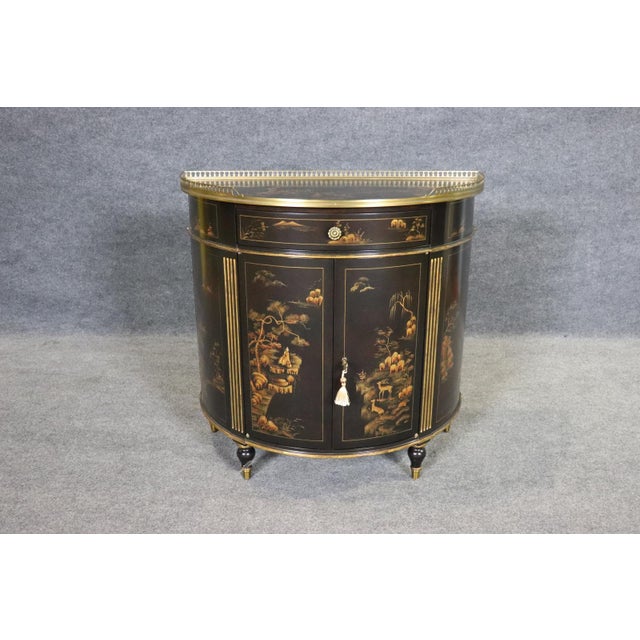 This elegant Theodore Alexander commode is a refined example of the brand’s dedication to historical design, fine...