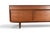 This low credenza was designed by John Herbert and produced by A Younger Ltd in England during the 1960s. The teak and...