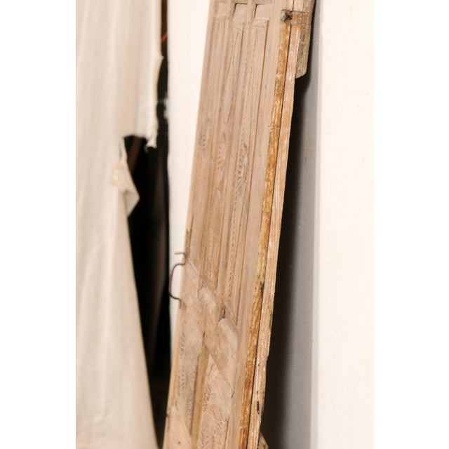 A single Turkish raised panel door from the 19th century. This antique door from Turkey has a nice 8 raised panel design...