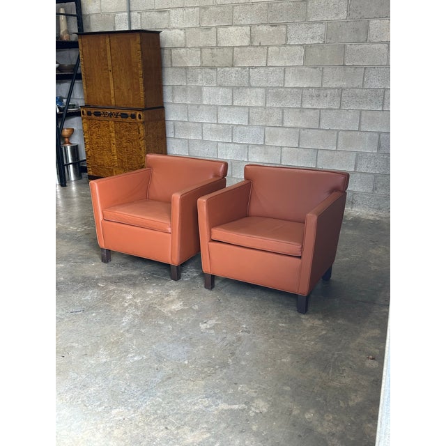 Wonderful pair of club chairs designed by Ludwig Mies van der Rohe for Knoll circa 2004. The original design of these was...
