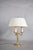 French bouillotte lamp — delicate gilt brass with cream fabric shade an exquisite and refined french bouillotte lamp of...