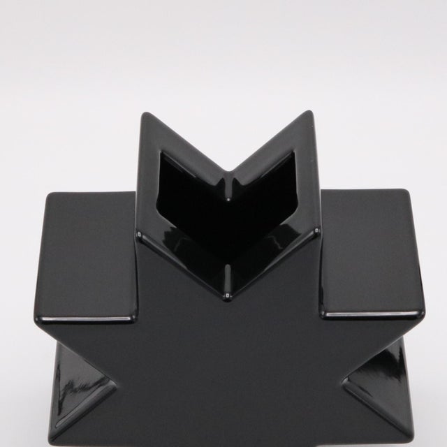 "Hsing" vase designed by Ettore Sottsass for Alessio Sarri, Sesto Fiorentino. Black glazed ceramic. Marked: E. Sottsass,...