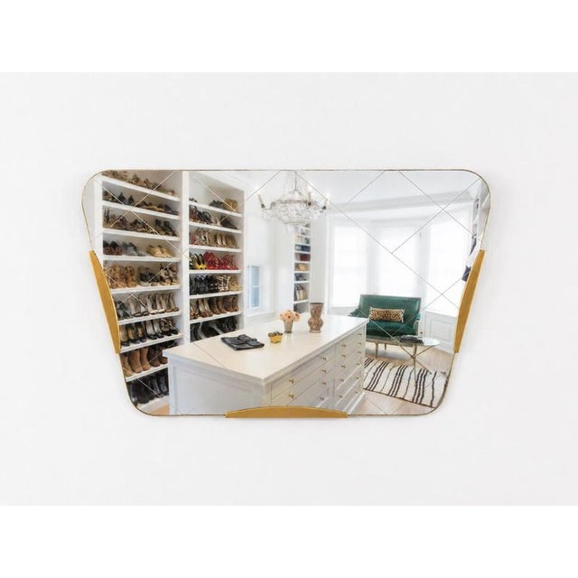 A charming mid-century wall mirror from the 1950s, handcrafted in vienna, austria. The mirror stands out through its size,...