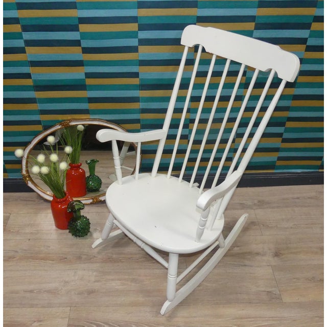 Charming, sturdy rocking chair. Wonderfully decorative and ideal for relaxing, reading, or as a nursing chair! White...