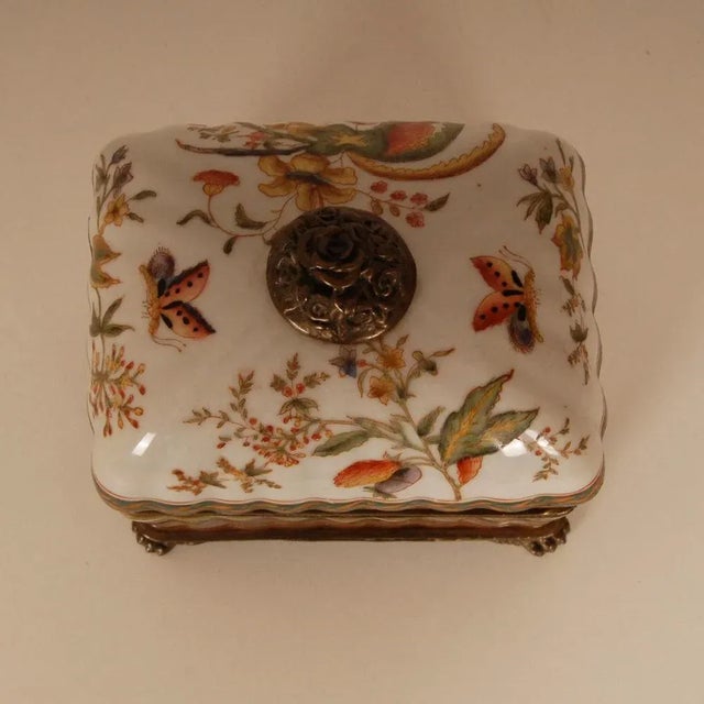 Porcelain bronze mounted box, Art Nouveau style Made of hand-painted crackled, glazed high quality bronze mounted...