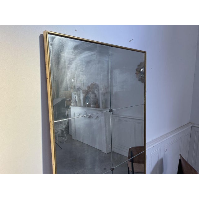 Large 1950s brasserie mirror. This particularly elegant Art Deco mirror with its gilded wooden frame will enhance an...