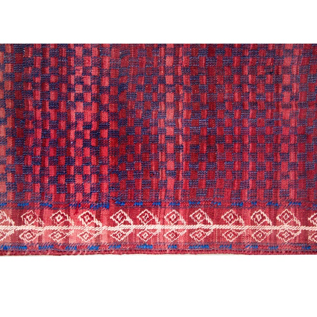A wonderful mid-20th century Persian Turkman runner with the most wonderful hand-embroidered indigo checkerboard pattern...