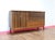 Discover the Mid Century Modern Vintage Credenza Sideboard Buffet in the style of Briitish furniture maker Vanson— a...