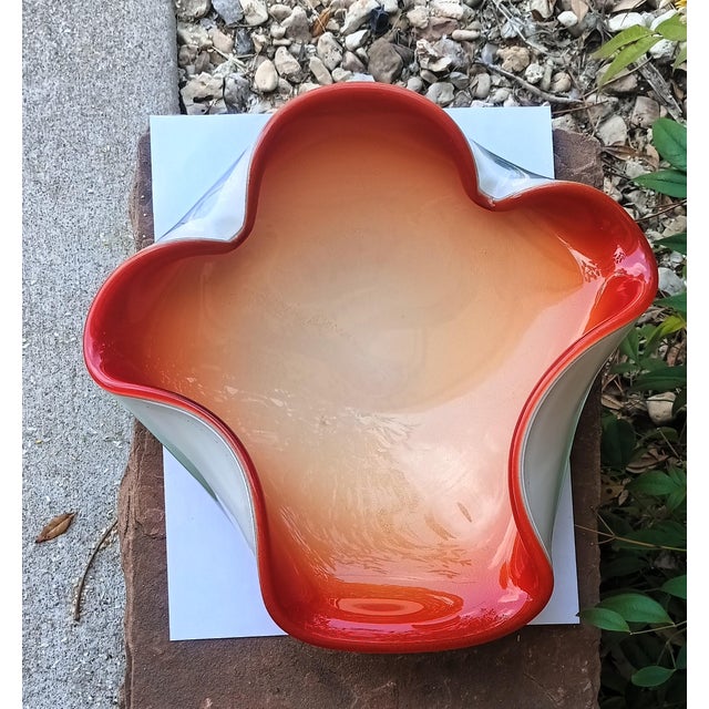 This bold and sculptural mid-century art glass bowl is a showpiece of Murano technique, attributed based on its masterful...