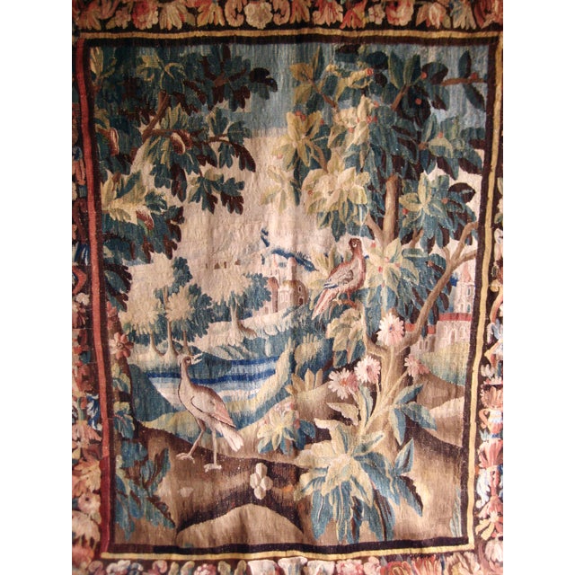 This piece is truly a wonderful tapestry complete with it s period borders , it present splendid colors , all the magic...