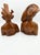 Offered is a striking, exceptionally detailed pair of mid-century hand-carved wooden busts depicting a traditional...