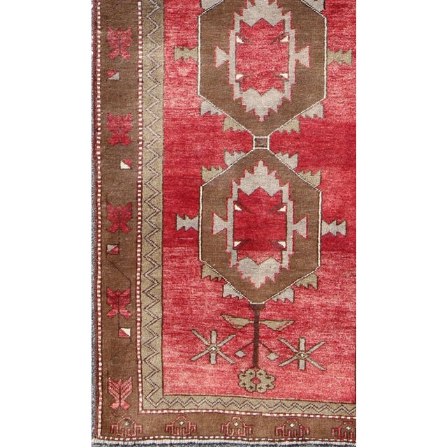 Vintage Turkish Oushak Medallion Runner in Soft Red, Lt. Blue, Cream Measures: 3'8'' x 9'7'' This beautiful vintage Oushak...