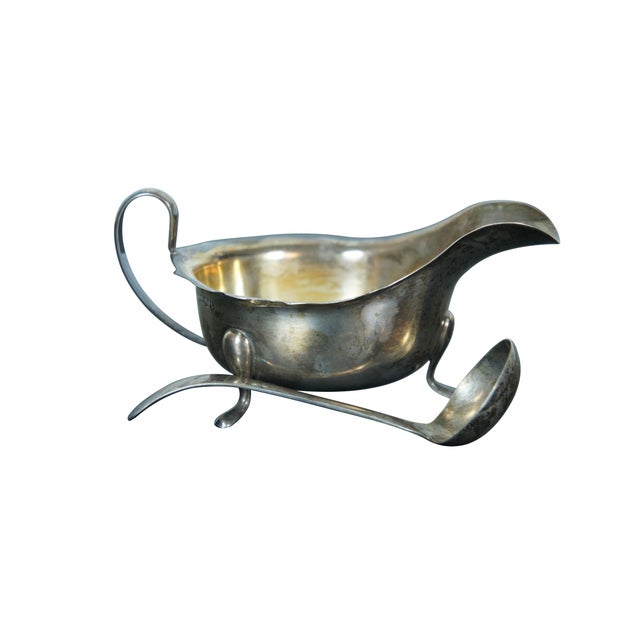Antique 1936 four piece Sheffield sterling silver gravy boat and sauce ladle set by Edward Viners Ltd. Includes two gravy...