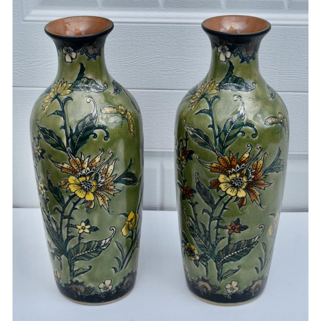 Vintage (1970's) Pair of Vases by Baum Bros. Made of Ceramic with Floral & Butterfly Details. The Background Color: Green....