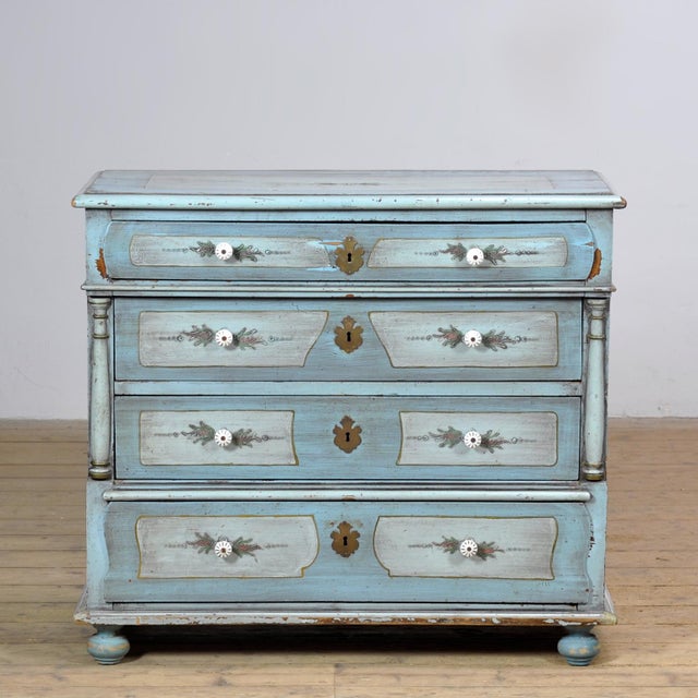 This piece of furniture is a 19th-century chest of drawers with Gustavian influences, a Swedish neoclassical style that...