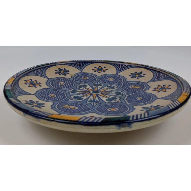 Antique moroccan plate, from 1820s, purchased in Fez. This is one of a large number of plates listed. Would look fantastic...