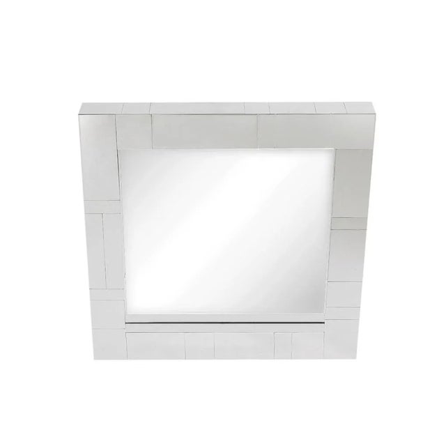 This chrome cityscape mirror is in the style of Paul Evans and is old stock and is being sold as found.