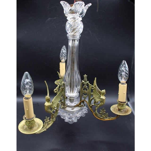 Crystal and Bronze Chandelier from the Baccarat Company, 19th Century, in Very Good conditions. Designed before 1890 This...