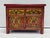 Set of two Tibetan bedside tables. The tables are hand-painted and feature decorative inlay work. Both tables have two...