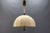 Beautiful adjustable-height three-light brass pendant lamp with a fabric lampshade, Germany, circa 1980. Made in the...