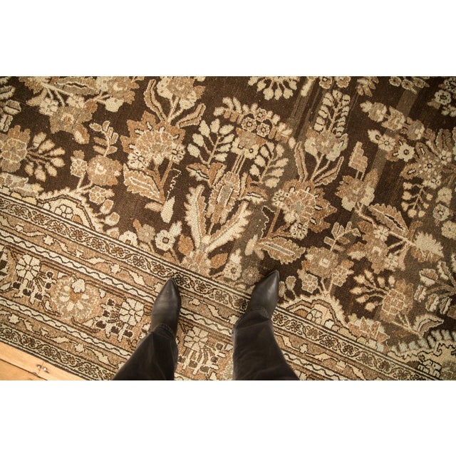 :: Diamond shaped center medallion with floral sprays stemming therefrom atop a covered field of inwardly directed...