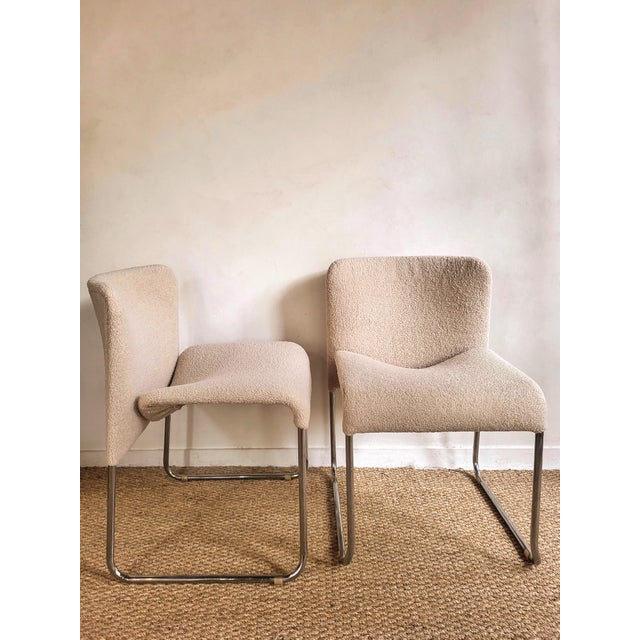 Italian chair from the 70s, tubular chrome-plated steel structure and seat reupholstered in ivory-colored curly wool.