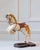 Charming and sculptural, this French decorative horse from the 20th century captures the elegance and vitality of...