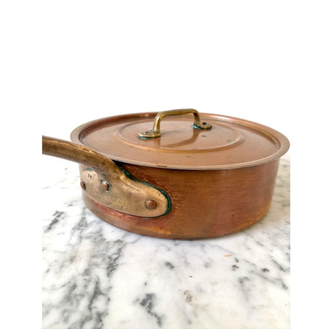 9” vintage copper pot with lid. A classic accessory for a French or farmhouse style.