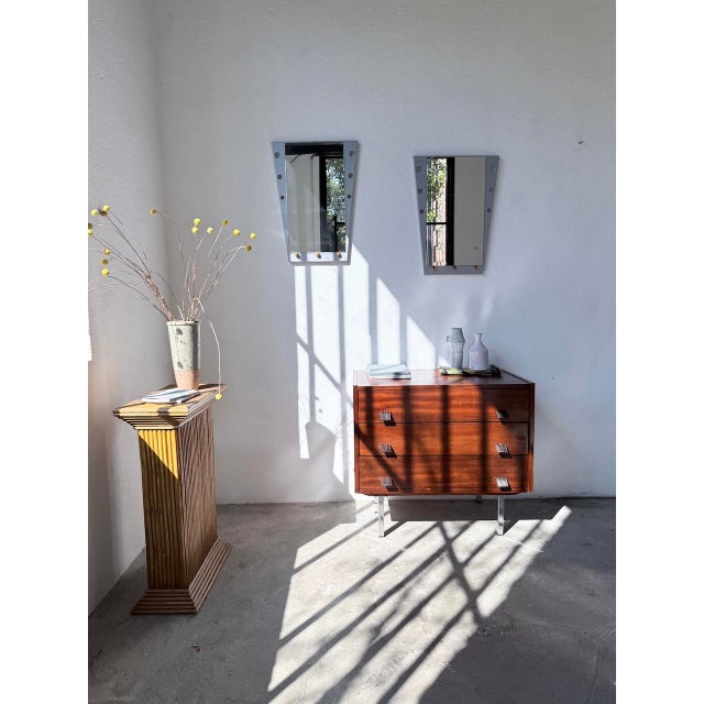 Set of two vintage mirrors from the 1980s, with their "Memphis" style look and inspiration. Framed in a gray chrome...