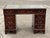Pedestal Desk In Flame Veneer Mahogany with Green Leather Top. Splits in 3 pieces for easier transportation. Signs of wear...