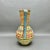 Vintage Mid Century Modern studio art pottery pitcher. The interior is glazed turquoise. The exterior is decorated with...