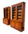Rare pair of Empire-Restoration style mahogany bookcases. Each features two glazed doors in the upper section with eight...