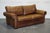 Vintage Comfortable Feather Filled Back Cushions Leather Sofa. A very good quality sofa, we believe it to be Collins &...