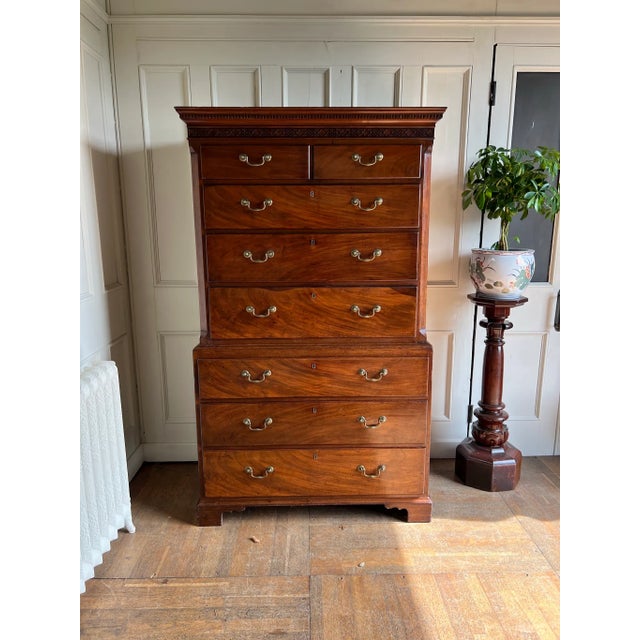 English, 18th century chest, raised on bracket feet. Well figured, mahogany, graduated drawers terminating with blind...