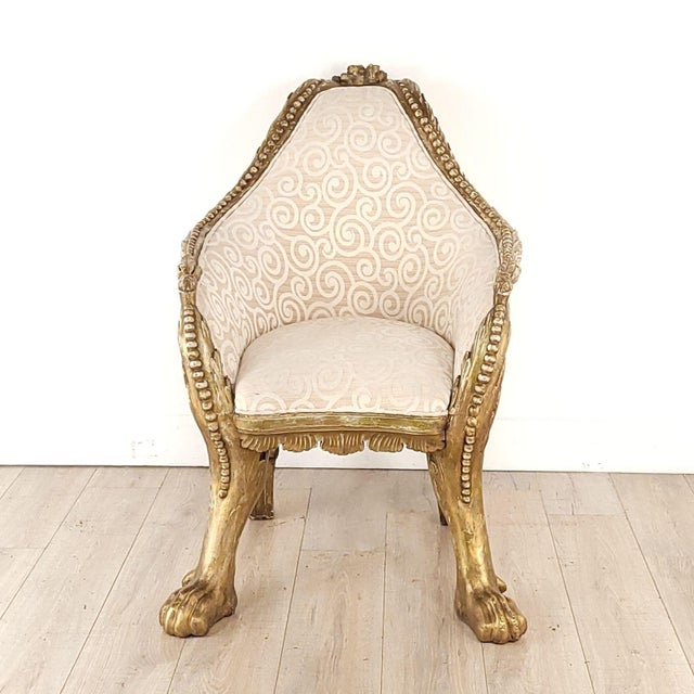 A Continental bergère, well carved with silver leaf, 18th or 19th century, from a tradition of fantasy furniture. Seat...