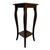 Elegant pedestal side table by The Bombay Company, crafted in dark-stained wood with a tall, slender silhouette. The...