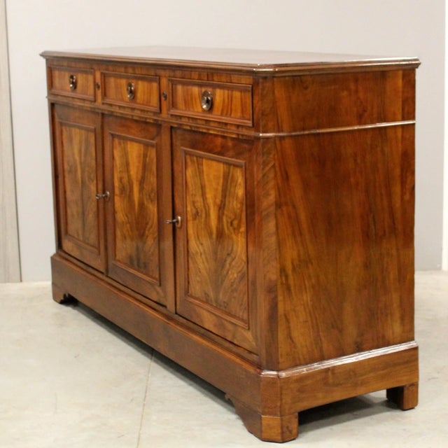 Louis Philippe 3-Door Sideboard Walnut Mid-19th century - Louis Philippe period Dimensions: width 180 cm, depth 52 cm,...