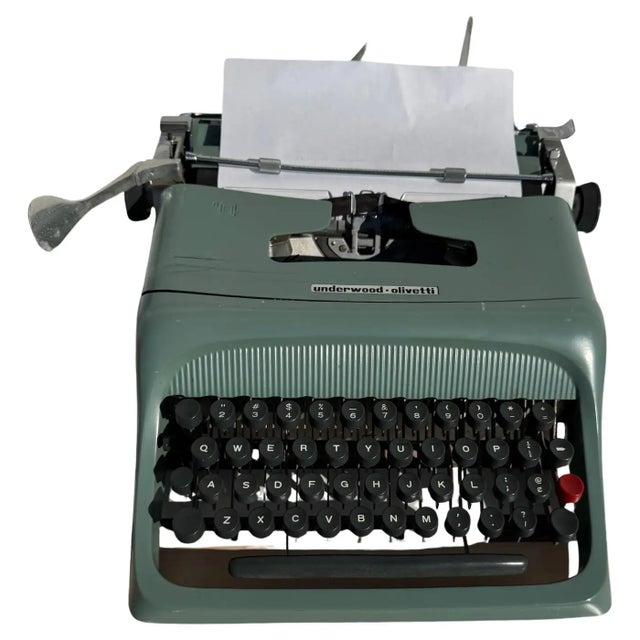 The Underwood-Olivetti Studio 44 typewriter embodies the fusion of artistry and functional design, making it a prized...