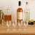 A timeless set of four vintage cordial glasses, perfect for serving liqueurs, dessert wines, or aperitifs in classic...