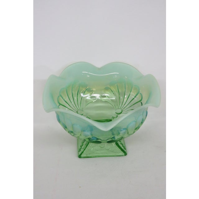 This gorgeous Candy Dish/ Compote Bowl is made of glass. This Bowl is made in the style of Beaded Fan, it features a very...
