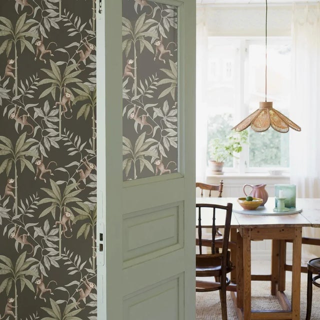 It’s hard to resist the cheeky charm of Boråstapeter’s Jungle Friends wallpaper. Featuring a family of adorable monkeys at...